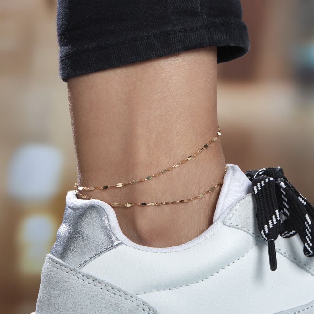 DE QUEL C&Ocirc;T&Eacute; PORTER LA CHA&Icirc;NE DE CHEVILLE, GAUCHE OU DROITE ?