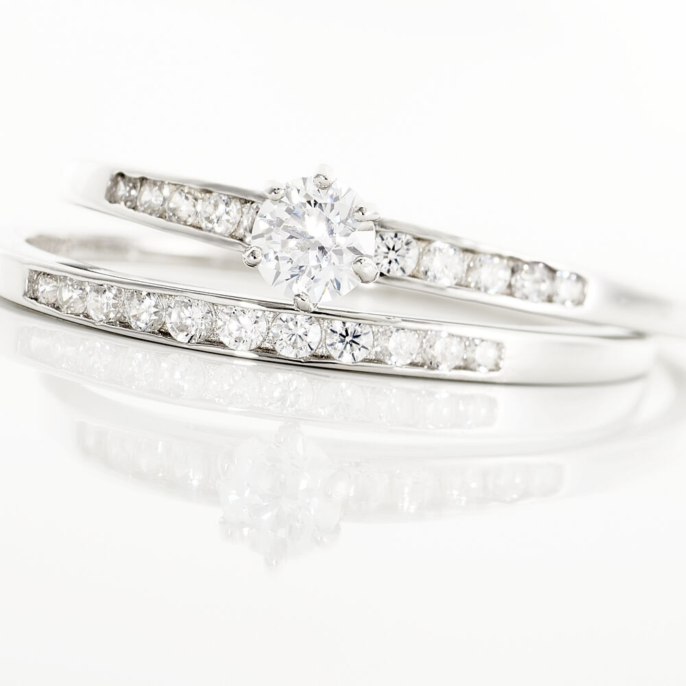 Bague solitaire et alliance Clearance
