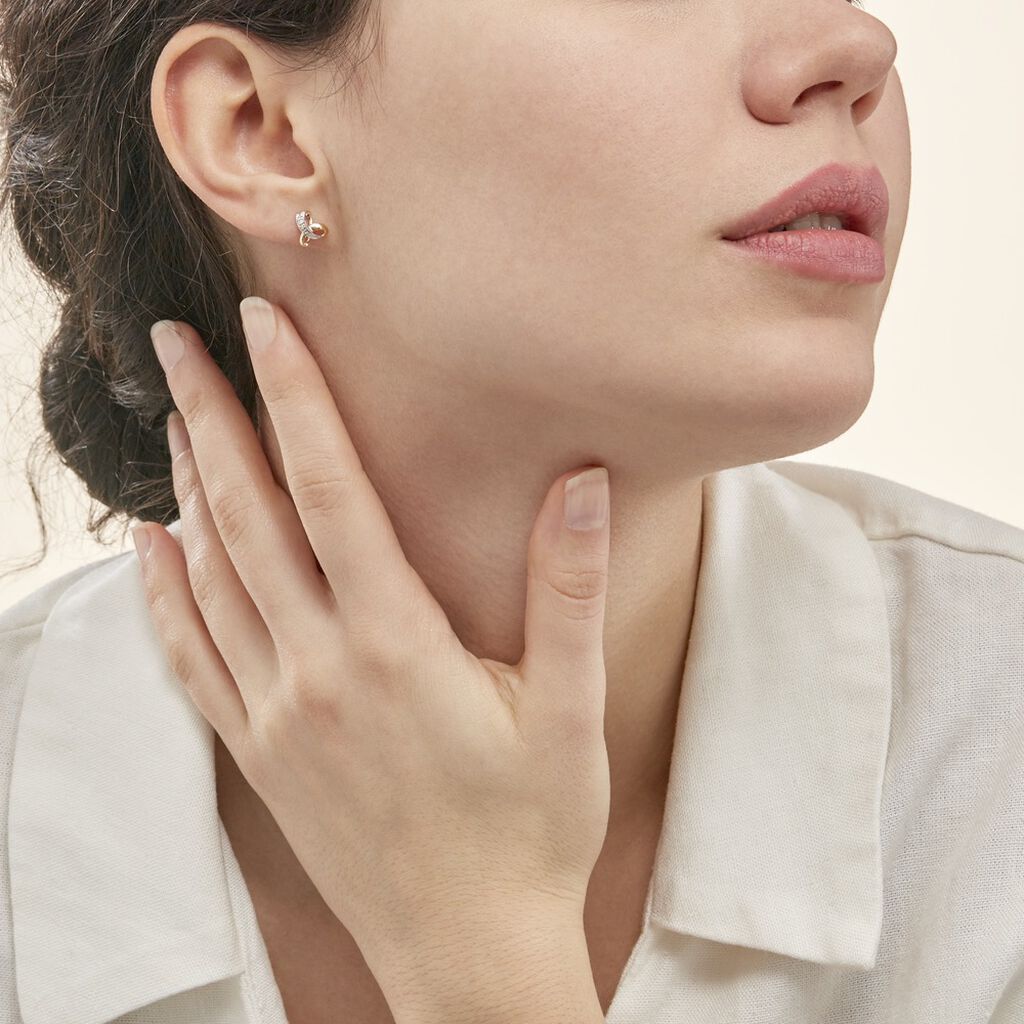 Boucles D'oreilles Puces Volute Or Jaune Diamant - Clous d'oreilles Femme | Histoire d’Or