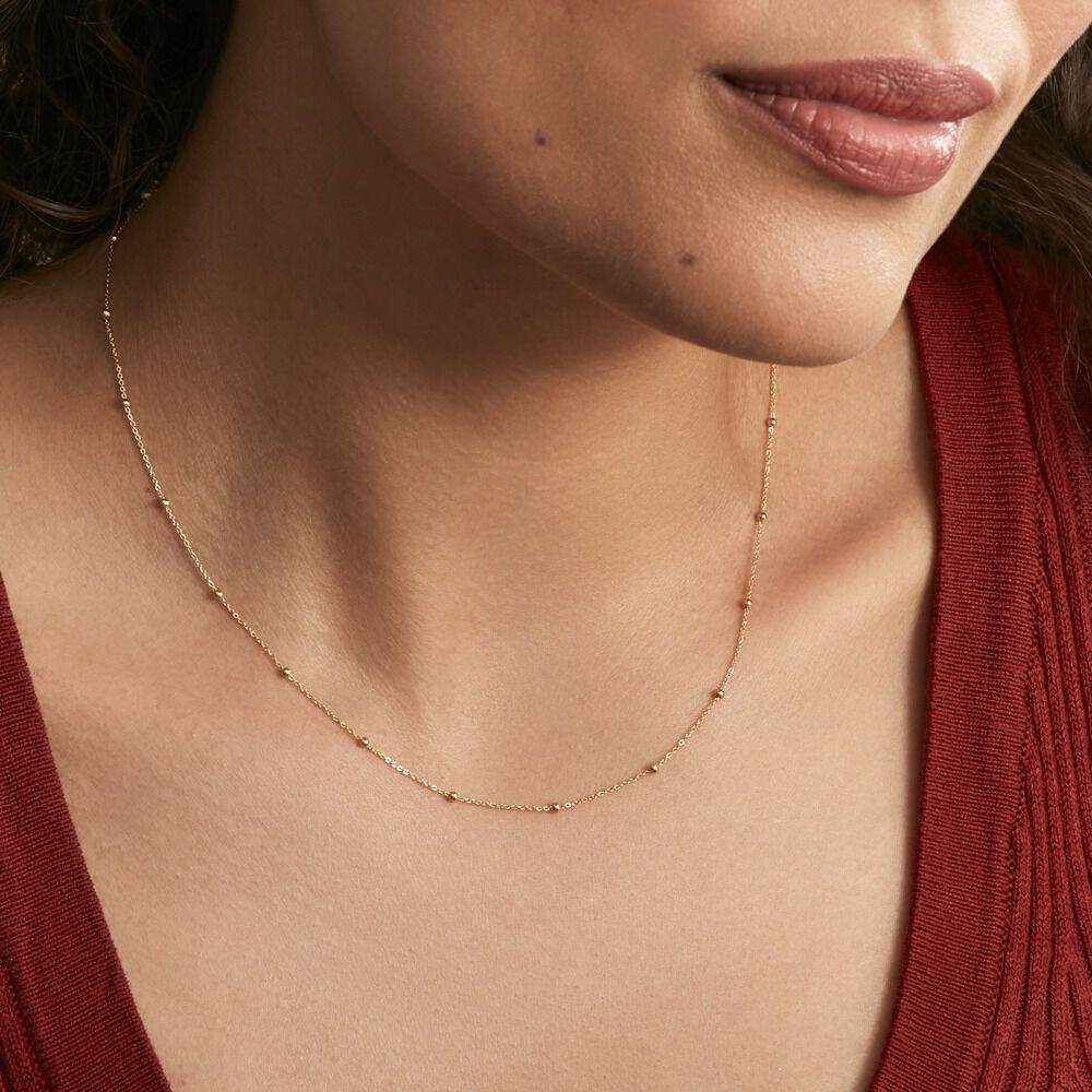 collier or petites boules